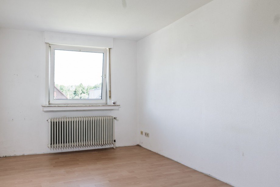 Obergeschoss-Zimmer 1 Zweifamilienhaus Bielefeld