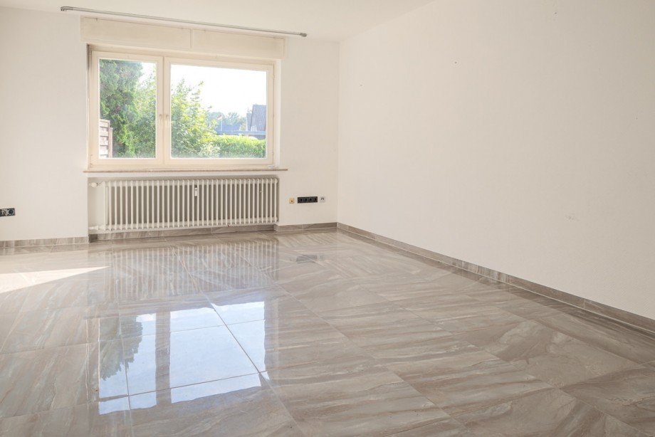 Wohnzimmer EG rechts Mehrfamilienhaus Bielefeld / Heepen