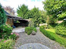 Garten Wohnen auf einer Ebene: Gepflegter Bungalow mit Traumgarten in guter Lage von Dissen