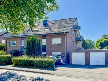 Hausansicht Vermietete EG - Wohnung mit Garage - Top gepflegt mit gro�em Garten in GT-Avenwedde