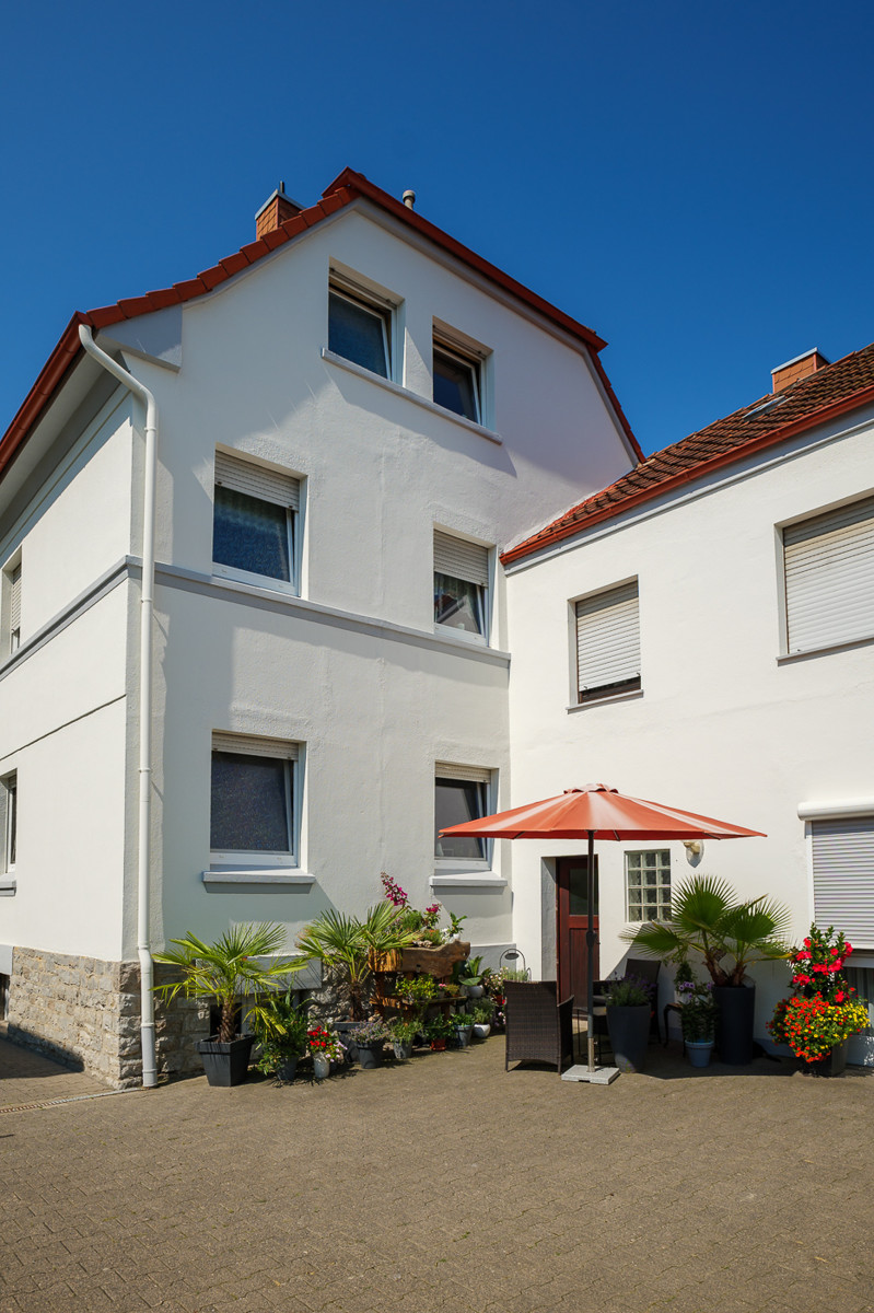 Geb�uder�ckseite Mehrfamilienhaus Lage