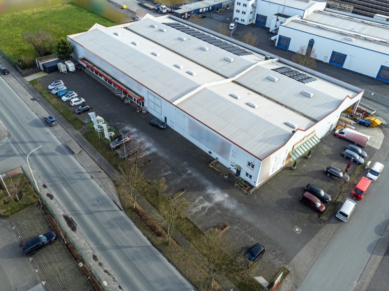 Erwitte Drohne aufbereitet Erwitte Einzelhandel Gewerbestandort mit PV-Anlage und guter Infrastruktur im Gewerbegebiet in Erwitte - gut vermietet -