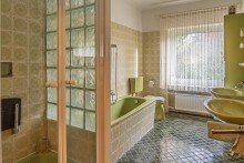 Bad Wohnen auf einer Ebene: Gepflegter Bungalow mit Traumgarten in guter Lage von Dissen