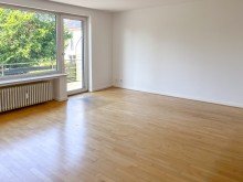 Wohnzimmer 3 Zimmerwohnung mit Balkon und Gartenblick im Bielefelder Westen