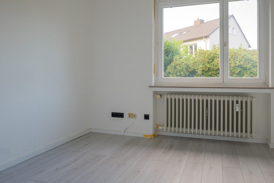 OG links Mehrfamilienhaus Bielefeld / Heepen